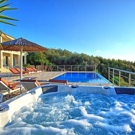 Beachfront Villa Seasun By Posarellivillas Agios Spyridon  ภายนอก รูปภาพ